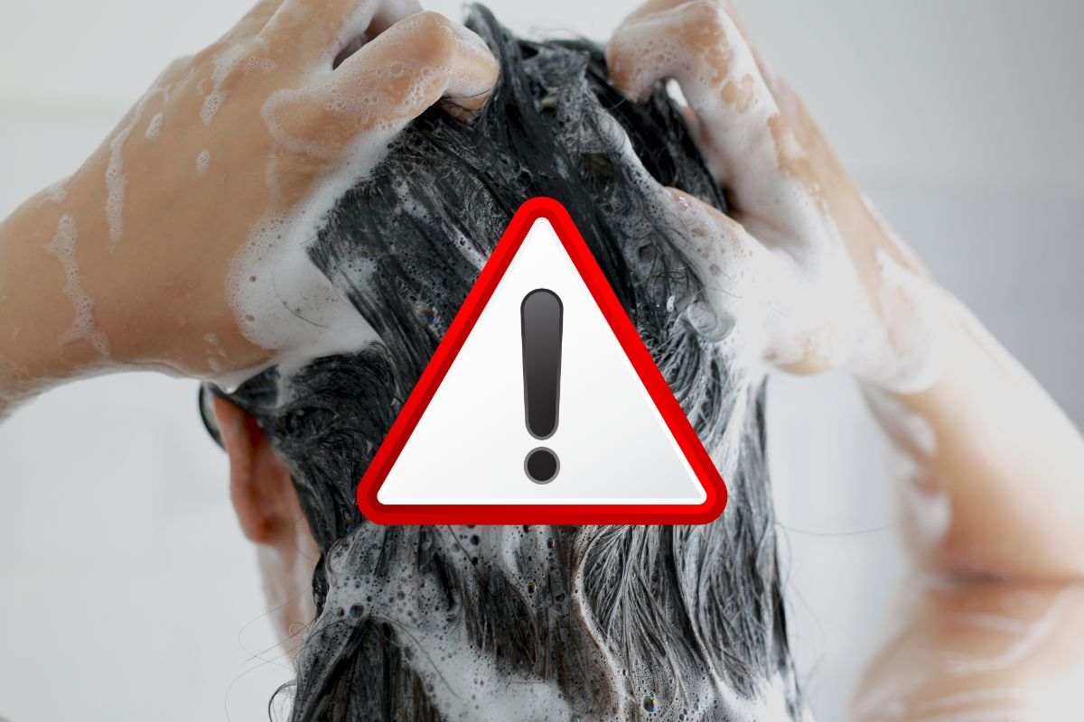 Donna che fa shampoo e simbolo divieto